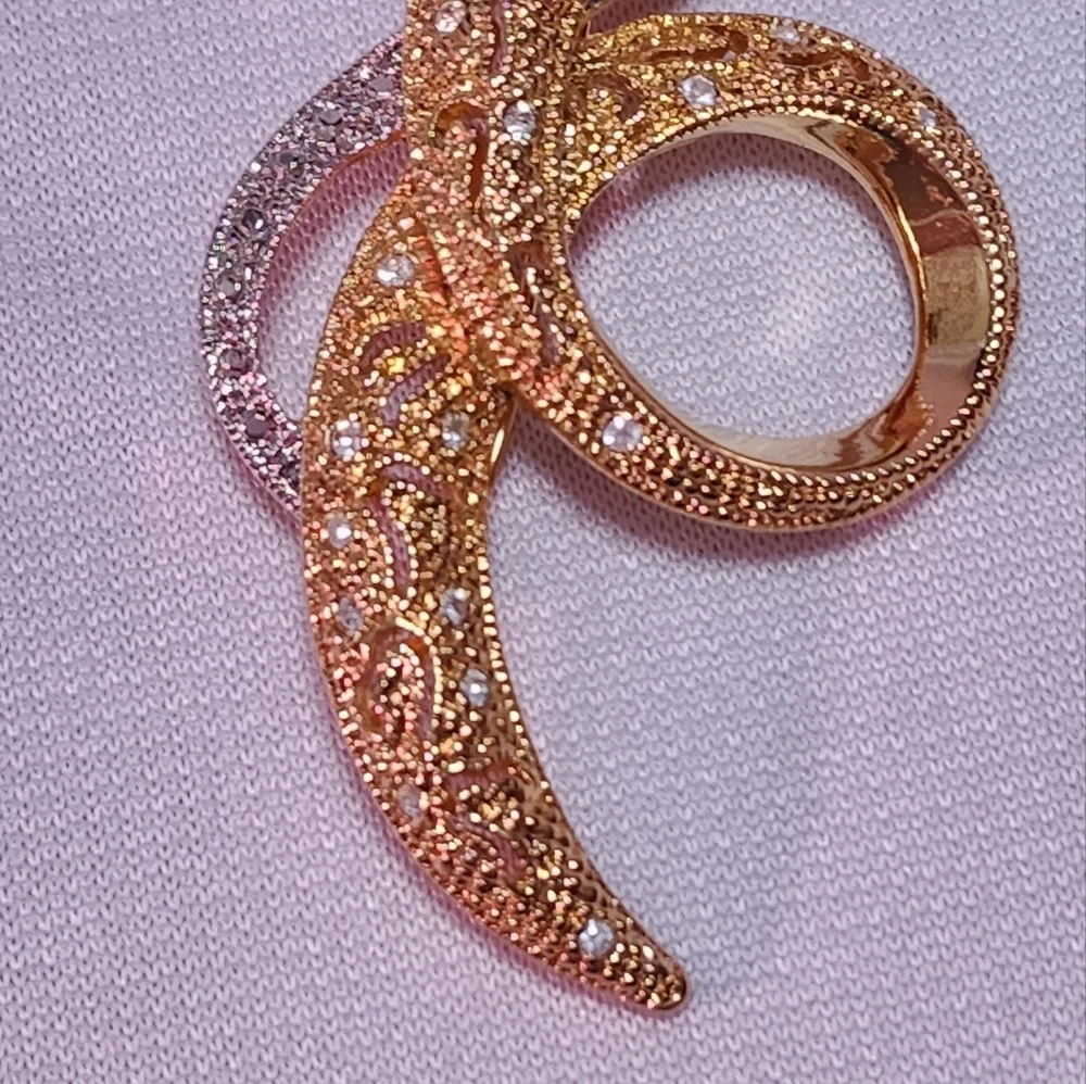 Avon Silver and Gold Tone Swirl Brooch with Rhinestones